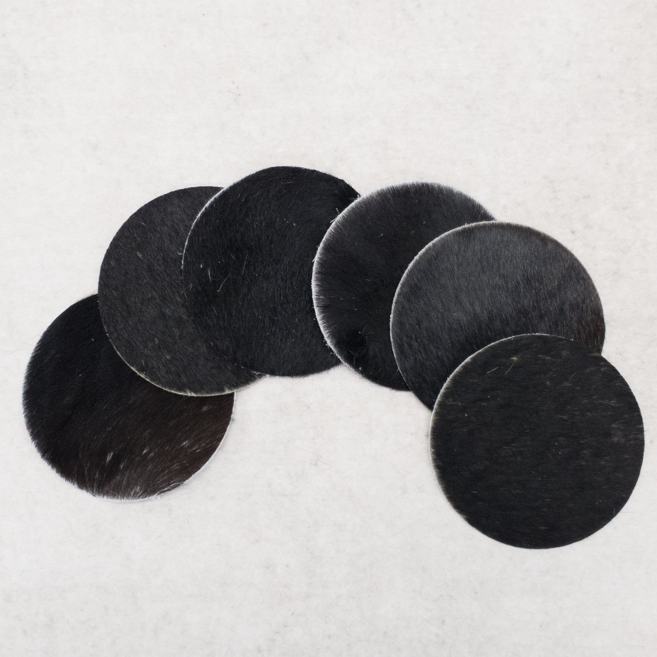 6pk Black Hair on Cow Western Coaster Set | Hair-On Leather Coasters, Round / Black / 6 pk | The Leather Guy