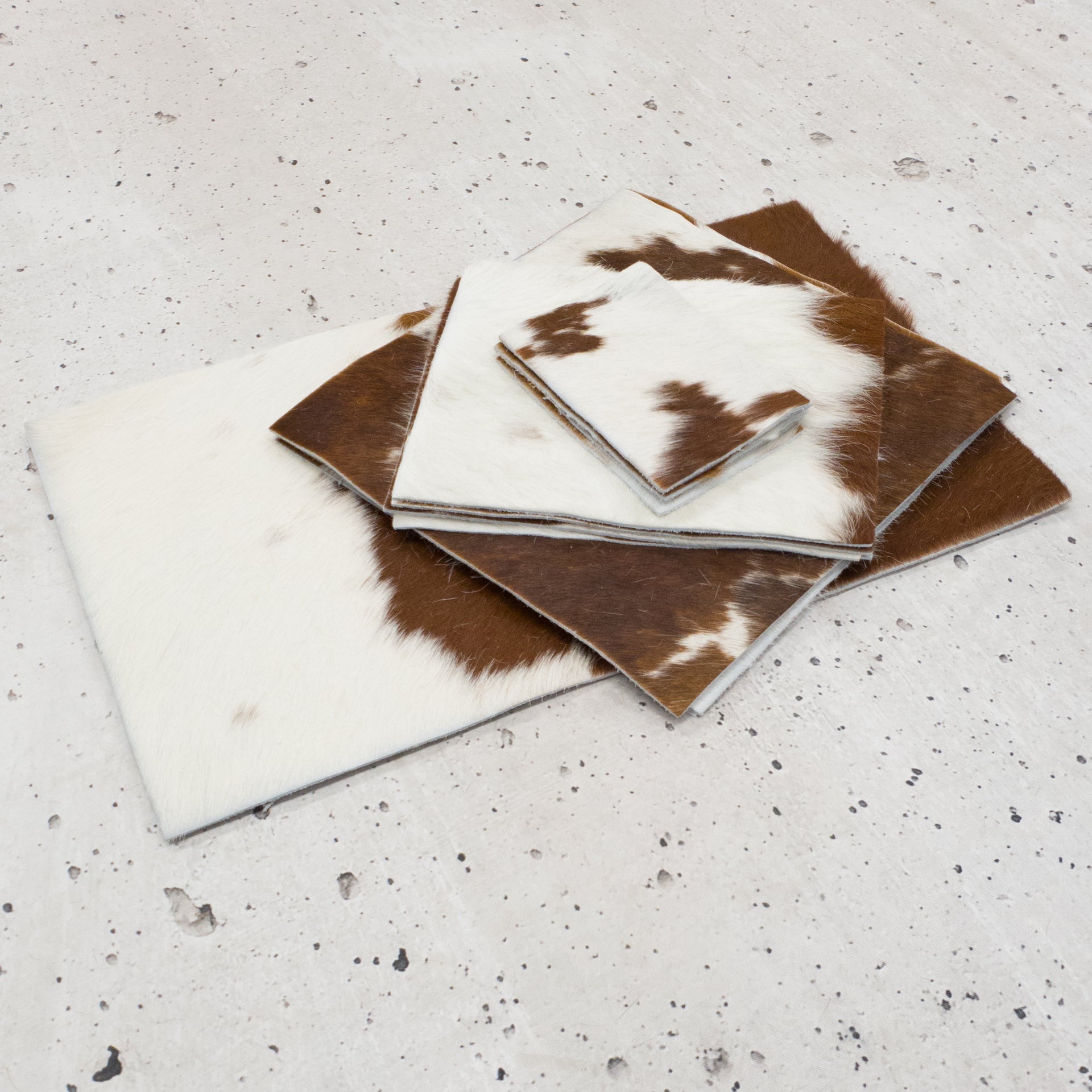 Bi Color Brown and Off White Hair on Cow Hide Pre-cuts, | The Leather Guy