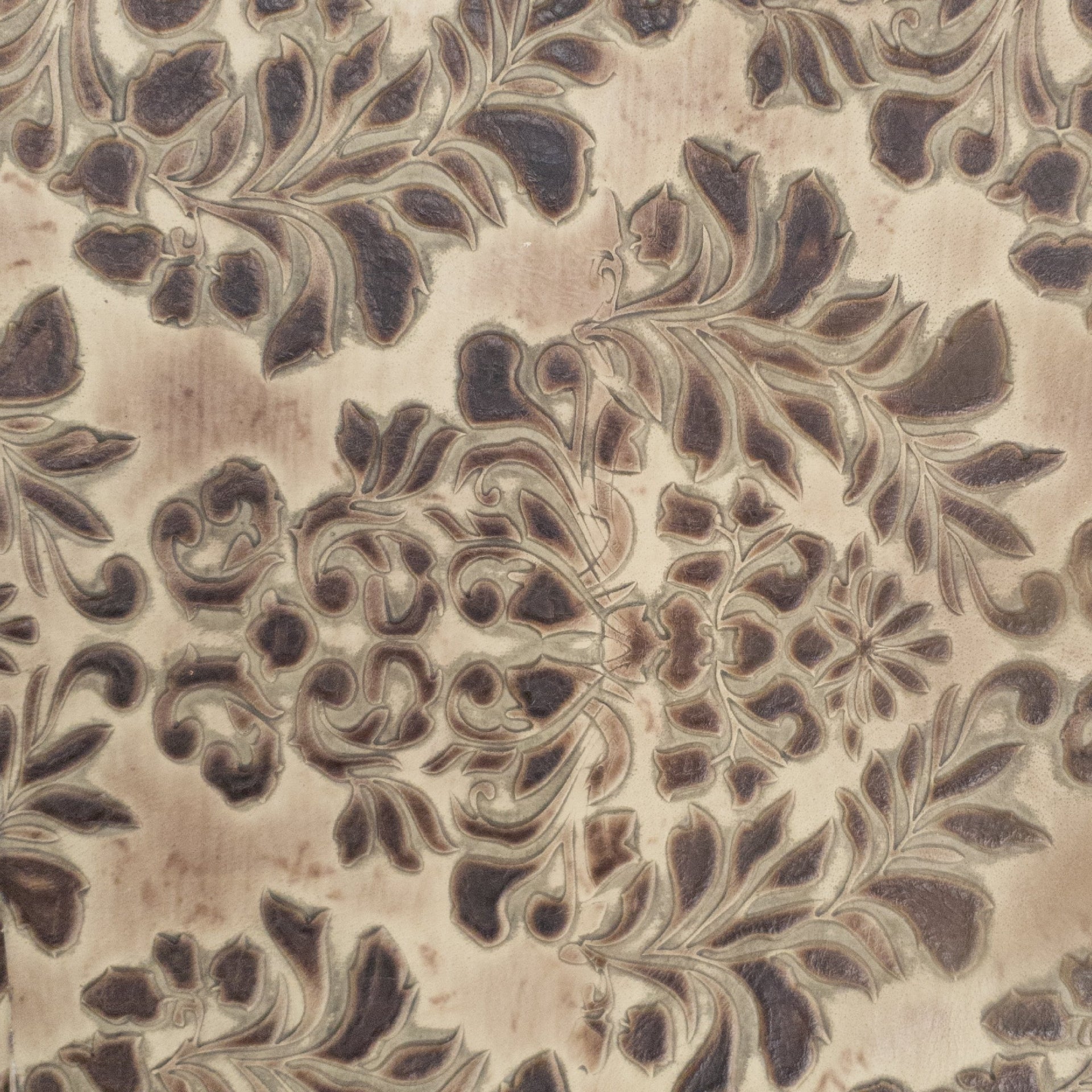 Western Cowhide Leather – 2–4 oz Embossed Grain – Large Pre-cuts, Tan/Creams / Stone Fluer De Lis / 10"x10" | The Leather Guy