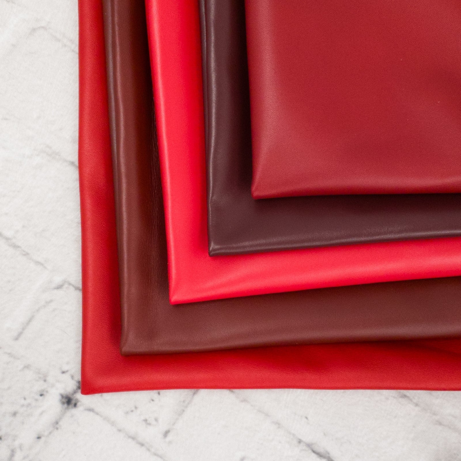 Reds, 3-8 Sq Ft, 1-3 oz, Lamb Hides | The Leather Guy