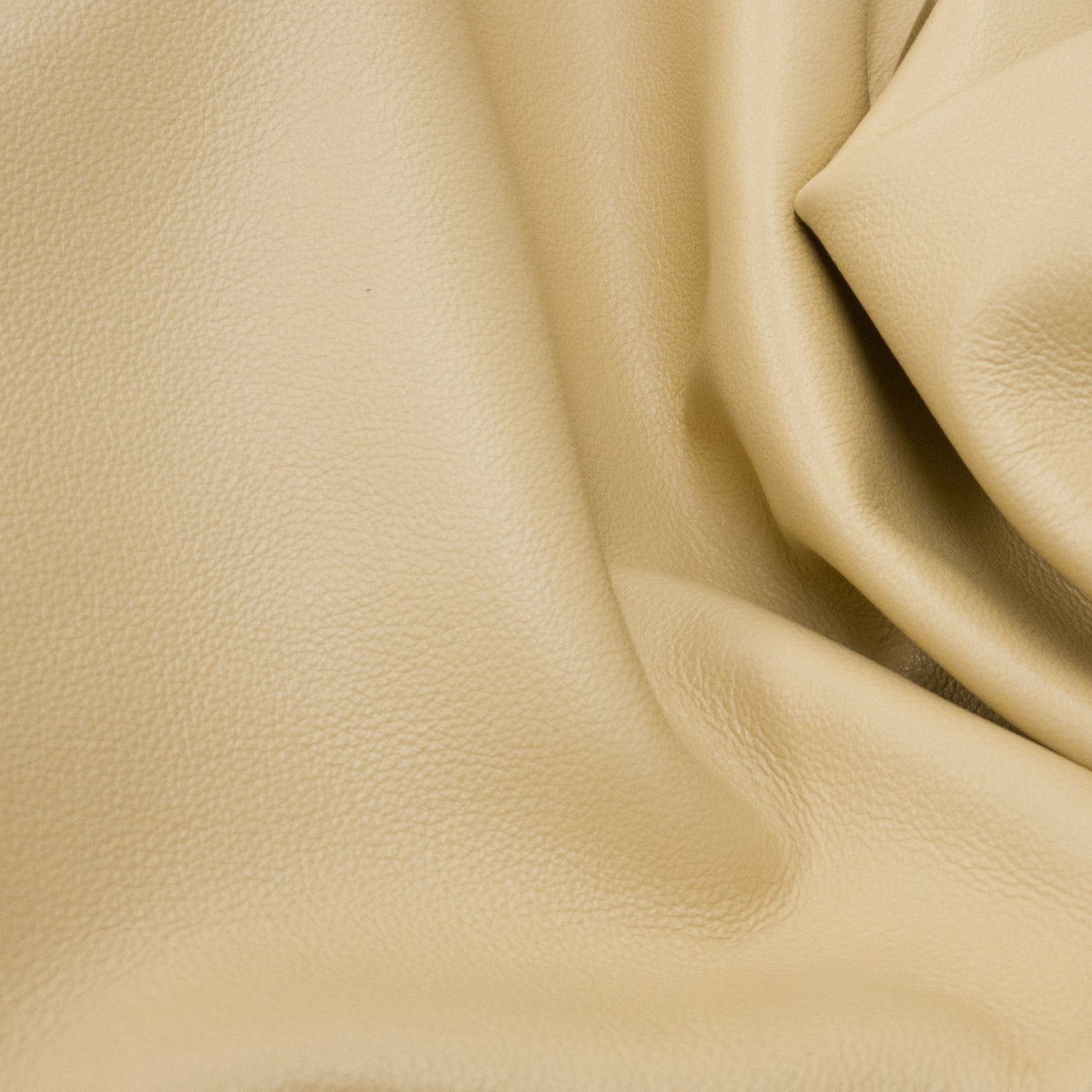 Neutrals, 2-4 oz, 25-64 SqFt, Full Upholstery Cow Hides, Custard - Low Grade / 49-56 / 2-3 | The Leather Guy